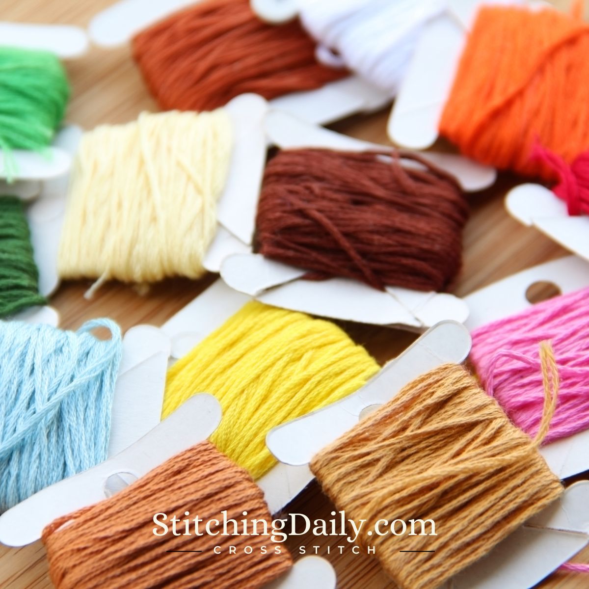 cross stitching floss on bobbins